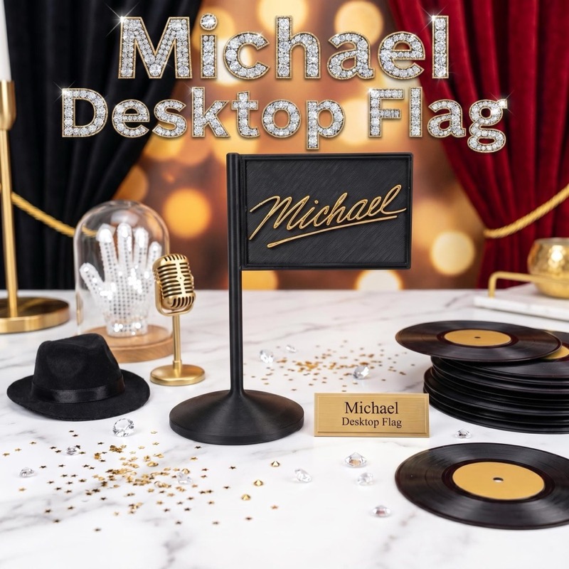 A black desktop flag with the name "Michael" in gold script.